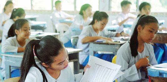 Malaysian Students Sitting for Exam.