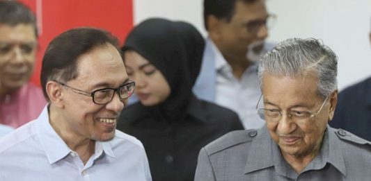 There's Widespread Suspicion That Anwar Was in Cahoots with Mahathir on Padding the Electoral Rolls in Sabah with Illegal Immigrants. - Nmh Filepic