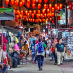 the Bustling Petaling Street, Kuala Lumpur That Sees the Arrival of Tourists After April 1, 2022. Today Bank Negara Announces an Increment in Opr.