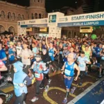 Participants at a Kuala Lumpur Marathon, As Rising Interest in Organised Runs Boosts Demand for Performance Gear, Benefiting Brands Such As Xtep.