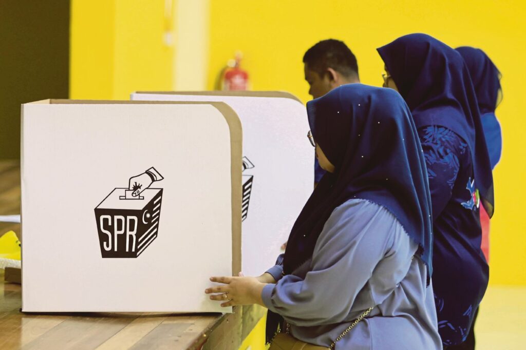 Voters Cast Their Ballots in a Malaysian Election. on 1 August, Negeri Sembilan Voters Will Decide the Composition of the 36-seat State Legislative Assembly in a Contest Whose Political Repercussions Could Reach Far Beyond the State. File Pic